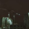 Коллективные инвестиции в недвижимость: строящийся дом и краны в Санкт-Петербурге